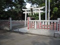 Traditional Japanese stone gate and fence at the Buddhist temple Royalty Free Stock Photo