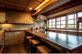 traditional japanese style kitchen with wooden countertops and stone backsplash Royalty Free Stock Photo