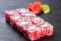 traditional Japanese sushi with salmon avocado and soft cheese garnished with red caviar. Japanese kitchen. Japanese restaurant Royalty Free Stock Photo