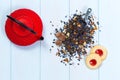 Traditional Japanese teapot, tea leaves and cookies Royalty Free Stock Photo