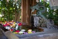 Japanese temple water fountain with a bronze dragon sculpture. Royalty Free Stock Photo