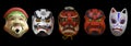 Traditional japanese theater masks on black