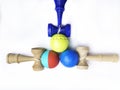 Colorful Kendama japanese toys, isolated on white, competition concept