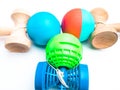 Colorful Kendama japanese toys, isolated on white, competition concept