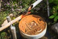 Traditional japanese water fountain in garden Royalty Free Stock Photo