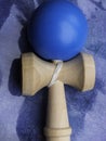 Traditional Japanese wood toy Kendama on glossy background, Symbol of Japanese boy toy