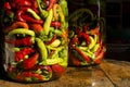 Traditional Jarred yellow, green, red, hot peppers. Royalty Free Stock Photo