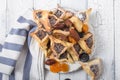 Traditional Jewish Hamantaschen cookies with dried apricots, dates. Purim celebration concept. ÃÂ¡arnival holiday background.