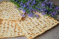 Traditional Jewish Passover matzoh with flowers.