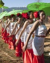 Traditional Jingpo Women with Parasols