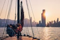 Traditional Junk boat against Hong Kong cityscape Royalty Free Stock Photo
