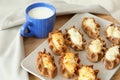 Traditional karelian pasties and cup of milk Royalty Free Stock Photo