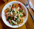 Traditional kaurma laghman noodles fried with vegetables, lamb and omelette. Asian dish Royalty Free Stock Photo