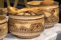 Traditional Kazakh wooden tableware with national ornament is sold on the market