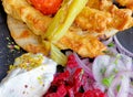 Traditional kebab meat plate with tzatziki sauce, pepperoni, beetroot and pita bread. Royalty Free Stock Photo