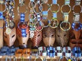 Traditional Kenyan souvenirs - wooden animal masks, beaded bangles Royalty Free Stock Photo