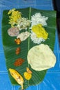 Food laid out on a banana leaf during the Onam festival