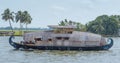 A traditional Kerala houseboat floating in the backwaters of Alappuzha or Aleppey