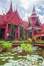 Traditional Khmer architecture and beautiful courtyard of the National Museum of Cambodia, lush pond with colorful lotus. Phnom Royalty Free Stock Photo