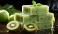 Traditional kiwi and mint Soap Bars on a Rustic Wooden Board