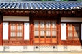 Traditional korean architecture, stone wall with wooden door in Gyeongbokgung Palace, Seoul, South Korea Royalty Free Stock Photo