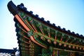 Traditional korean decorated woodwork on the roof of Changdeokgung Palace in South Korea Royalty Free Stock Photo