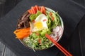 Traditional Korean dish- Bibimbap, rice with egg, beef and vegetables Royalty Free Stock Photo