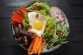 Traditional Korean dish- Bibimbap, rice with egg, beef and vegetables Royalty Free Stock Photo