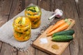 Traditional Korean snack of cucumbers in two glass jars: cucumbers marinated with carrots, hot pepper and garlic. Royalty Free Stock Photo