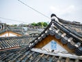 Traditional Korean tile roof hanok seoul ,south korea.Sunshine lighting flare. Royalty Free Stock Photo