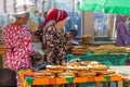 Woman sells traditional round bread at the asian market in Kyzgyzstan