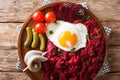 Traditional Labskaus recipe of potato, corned beef and beet with