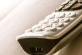 Traditional landline phone isolated on wooden desk background Royalty Free Stock Photo