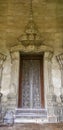 Traditional Lao style Buddhist church door Royalty Free Stock Photo