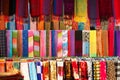 Traditional Laotian dresses and scarf in clothing store