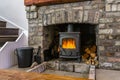 Traditional large brick fireplace in a living room Royalty Free Stock Photo