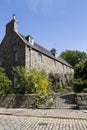 Large fieldstone and slate-roofed town house in Aberdeen