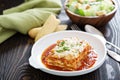 Traditional lasagna on white plate