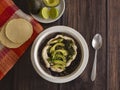 Traditional Latinamerica Black Beans Soup with Avocado and Cream including Homemade Flat Tortilla