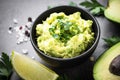 Traditional latinamerican mexican sauce guacamole on black. Royalty Free Stock Photo