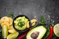 Traditional latinamerican mexican sauce guacamole on black. Royalty Free Stock Photo