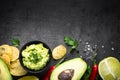 Traditional latinamerican mexican sauce guacamole and chips on b Royalty Free Stock Photo