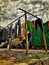 Traditional laundry drying on a bamboo rack in a rustic backyard Royalty Free Stock Photo