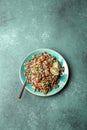 Traditional Lebanese salad tabouli tabule with quinoa, herbs, tomatoes, mint and lemon