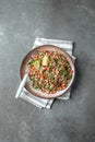 Traditional Lebanese salad tabouli tabule with quinoa, herbs, tomatoes, mint and lemon