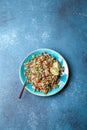 Traditional Lebanese salad tabouli tabule with quinoa, herbs, tomatoes, mint and lemon