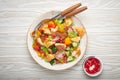 Traditional Levant dish Fattoush salad, Arab cuisine, with pita bread croutons, vegetables, herbs. Healthy Middle