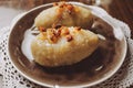 Traditional Lithuanian dish of stuffed potato dumplings - cepelinai Royalty Free Stock Photo