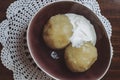 Traditional Lithuanian dish of stuffed potato dumplings cepelinai. The dumplings are made from grated and riced potatoes and Royalty Free Stock Photo