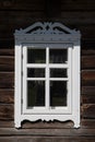 Traditional lithuanian house detail - window with traditional ornaments